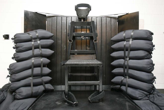 This June 18, 2010, file photo shows the firing squad execution chamber at the Utah State Prison in Draper, Utah. Utah’s Gov. Gary Herbert will not say if he’ll sign a bill to bring back the firing squad but does say the method would give Utah a backup execution method. Herbert’s spokesman Marty Carpenter issued a statement about the bill Tuesday in response to questions from reporters. Utah’s Senate is set to cast a final vote on the bill this week. It would call for a firing squad if lethal injection drugs cannot be obtained 30 days before an execution.