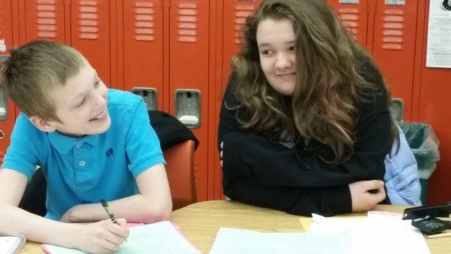 Bobby McClosky, left, and Kaitlyn Booth, fifth graders at Smithfield Elementary, go over plans for a March 26 talent show at the school that will donate proceeds to the Susan G. Komen Foundation as the service learning project required for gifted learning students.

Photo provided