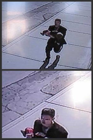 In this combination of still images taken from surveillance video on Sunday, March 8, 2015, and provided by the Lincoln County Sheriff's Office, a man runs down a street, carrying a toddler in an apparent kidnapping attempt in Sprague, Wash. The video shows the boy's young sister chasing after the man, who set the boy down and ran off. Lincoln County Sheriff Wade Magers says officers don't have any leads in the search for the suspect, but they don't believe the man is a resident of the town of about 500 people. The boy, 22-month-old Owen Wright, was unhurt. (AP Photo/Lincoln County Sheriff's Office)