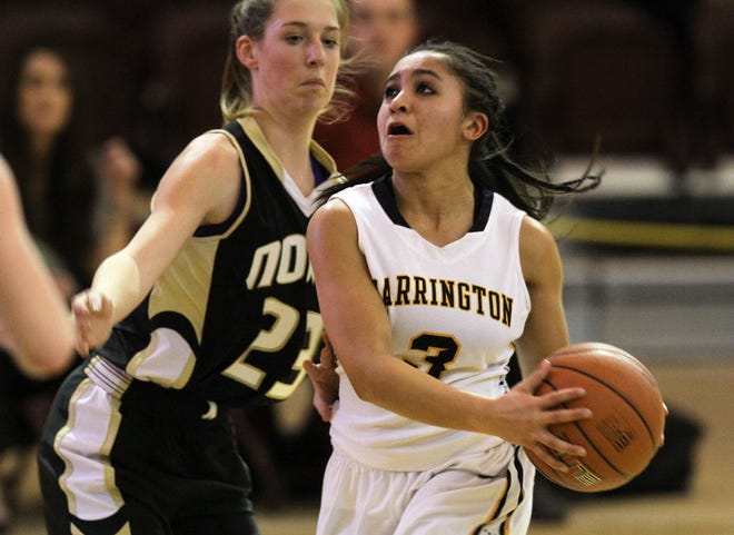 Barrington's Sarah Middleton drives to the basket against North Kingstown during the Division I semifinals.