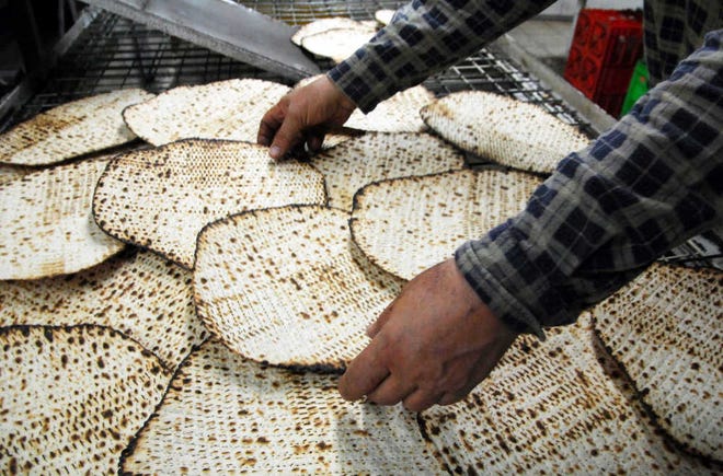 An unleavened bread, Matzah is traditionally eaten by Jews during the week-long Passover holiday.