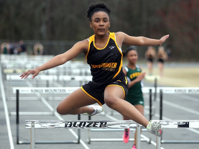 Yasmine Smith of Kings Mountain runs in the 100-meter hurdles during the track meet at Kings Mountain High School on Thursday.