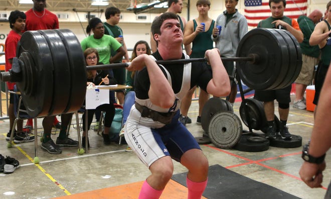 Arnold weightlifter Kris Sipe competes in the clean and jerk during Thursday's' Bay County Meet at Mosley.