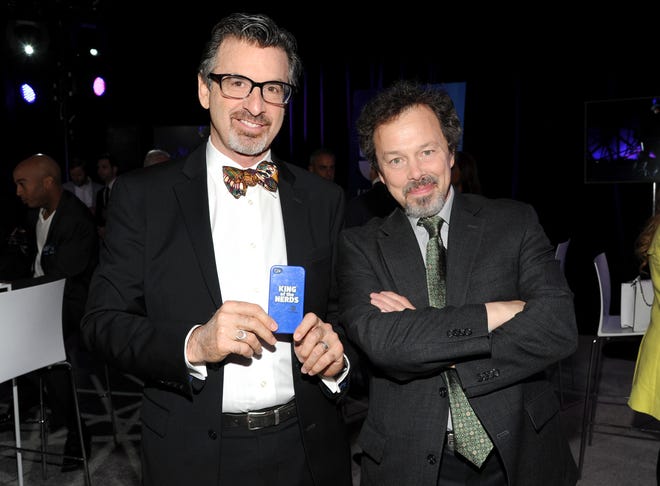 FILE - In this May 15, 2013 file photo, "King of the Nerds" co-hosts Robert Carradine, left, and Curtis Armstrong attend the TNT and TBS 2013 Upfront at the Hammerstein Ballroom, in New York. Carradine has been cited for careless driving for a crash that injured himself and his wife, Edith, in Colorado. The accident happened March 5, 2015, near Dolores in the state’s southwestern corner. The Colorado State Patrol says the 60-year-old “Revenge of the Nerds” star crossed into the oncoming lane on Colorado Highway 145, crashing into a tractor-trailer. (Photo by Evan Agostini/Invision/AP, File)