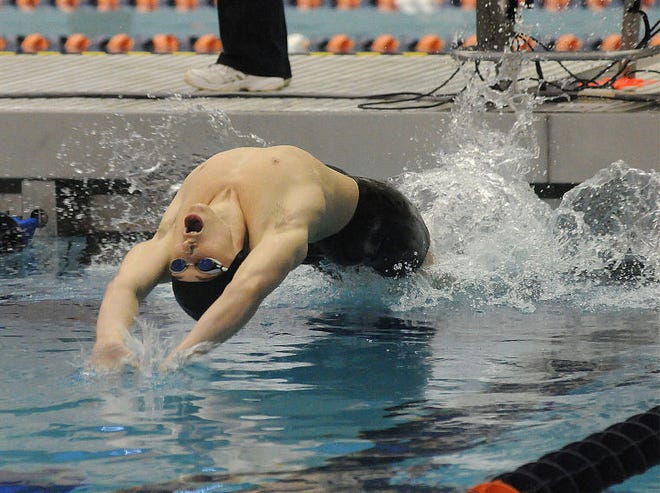 Pennsbury's Connor Doyle starts the 100 yard backstroke during the PIAA State swimming championships at Bucknell University in Lewisburg on Saturday, March 14, 2015. Doyle placed fifth with a time of 50.26.
