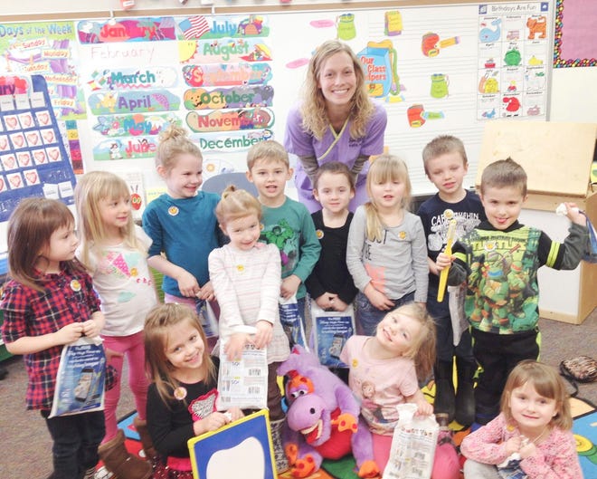 Dental Hygienist Kaitlyn Flint from Smile Avenue taught students at the Kinder Learning Academy about the importance of taking care of their teeth. Courtesy Photo