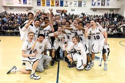 Photos by Warren Westura/New Jersey Herald — Pope John High team members celebrate after topping Christian Brothers Academy on Saturday night in Toms River to win the Boys Basketball Non-Public A State Championship.