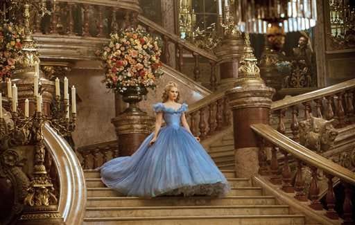 This image released by Disney shows Lily James as Cinderella in Disney's live-action feature film inspired by the classic fairy tale, "Cinderella."