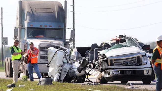 Authorities investigate an early morning accident on US 27 south of South Bay which killed four people Tuesday, March 17, 2015. (Lannis Waters/The Palm Beach Post)