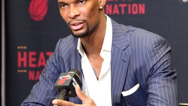 Miami Heat forward Chris Bosh talks about his health and recovery during a press conference on Monday, March 9, 2015. (Hector Gabino/El Nuevo Herald/TNS)