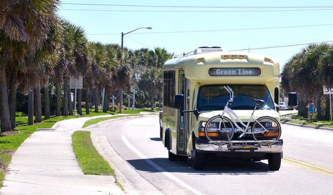 PETER.WILLOTT@STAUGUSTINE.COM A Sunshine Bus travels down A1A Beach Boulevard in St. Augustine Beach on Monday, March 16, 2015.