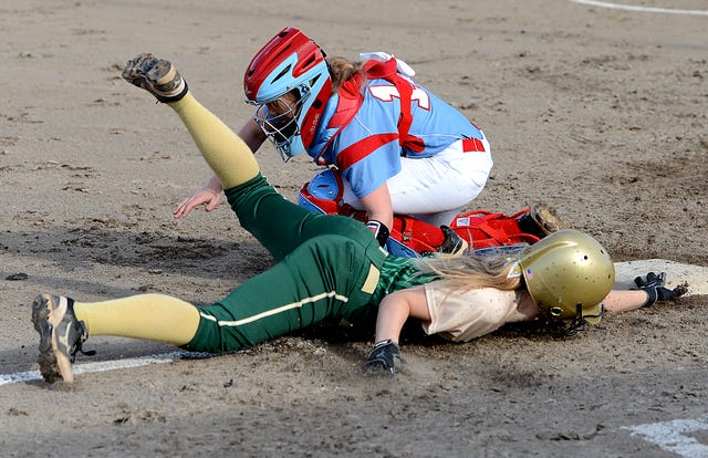 BRIAN D. SANDERFORD • TIMES RECORD Alma's Hailey Ostrander slides safely into third as Southside catcher Hailey Hogue covers the bag on Monday, March 16, 2015 in Alma. 
 BRIAN D. SANDERFORD • TIMES RECORD Alma's Cierra Rainwater, right, catches a Southside fly ball as Zoie Lunsford backs up the play during the first inning on Monday, March 16, 2015 in Alma. 
 BRIAN D. SANDERFORD • TIMES RECORD Alma's Hailey Ostrander lunges for a line drive, that was just out of reach, hit by Southside's Paige Mendoza on Monday, March 16, 2015 in Alma. 
 BRIAN D. SANDERFORD • TIMES RECORD Alma's Rachel Longmate makes an over the shoulder catch on a ball hit by Southside's Hailey Hogue on Monday, March 16, 2015 in Alma.