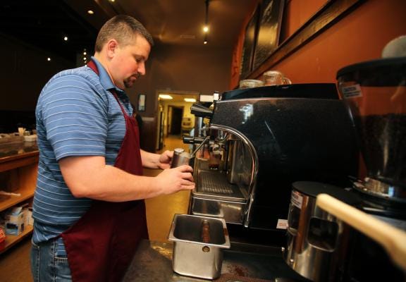 Brittany Randolph/The Star
Chris Parker makes a latte inside J. Oliver’s in Kings Mountain on Tuesday.