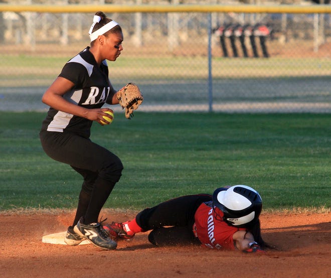Havelock's Kennedy Campbell touches second base ahead of the slide of Jacksonville's Jamey Banks during the first inning Tuesday. Havelock won the game 10-2.