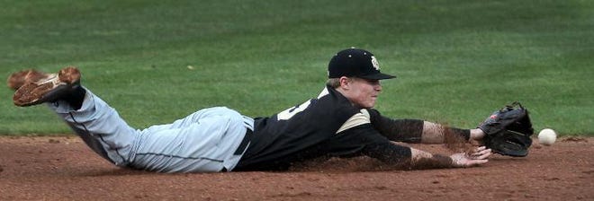 A ball hit up the middle is just out of reach of diving North Gaston shortstop Drew Green during Friday’s game against Forestview. The Jaguars survived the low-scoring evening, 3-2, to take over sole possession of first place in the Big South Conference.