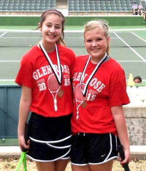 Ashlyn Reynolds (left) and Emileigh Cantwell go 4-1 in the Iredell Tournament to place third in JV girls' doubles. They were the lone Glen Rose players to win multiple matches.