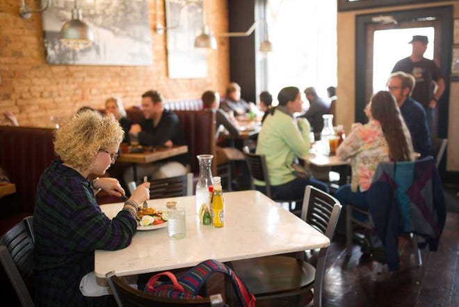 Diners eat lunch at The Place on Friday, March 20, 2015, in Athens, Ga. (AJ Reynolds/Staff, @ajreynoldsphoto)