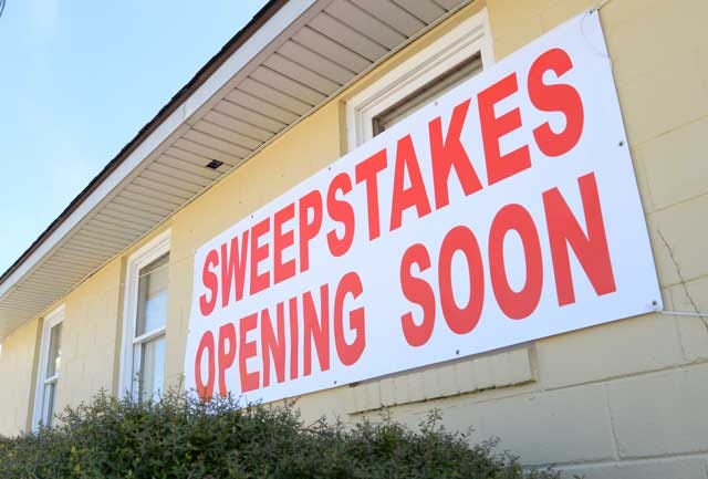 A large sign on a building on N.C. 11 just outside Grifton advertises the opening of a new sweepstakes parlor.