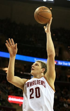 The Cavaliers' Timofey Mozgov puts up a shot in the first quarter of Friday's game win against Indiana.