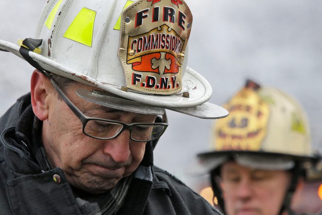 New York’s Fire Commissioner Daniel Nigro describes the fire to reporters during a news conference Saturday in the Brooklyn borough of New York.