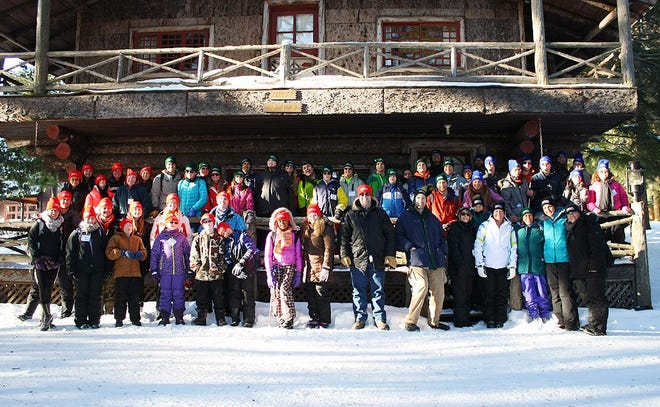 Campers, counselors and staff of Winter Camp Abilities - CABVI are pictured in front of the chalet at Camp Huntington in Raquette Lake. SUBMITTED PHOTO