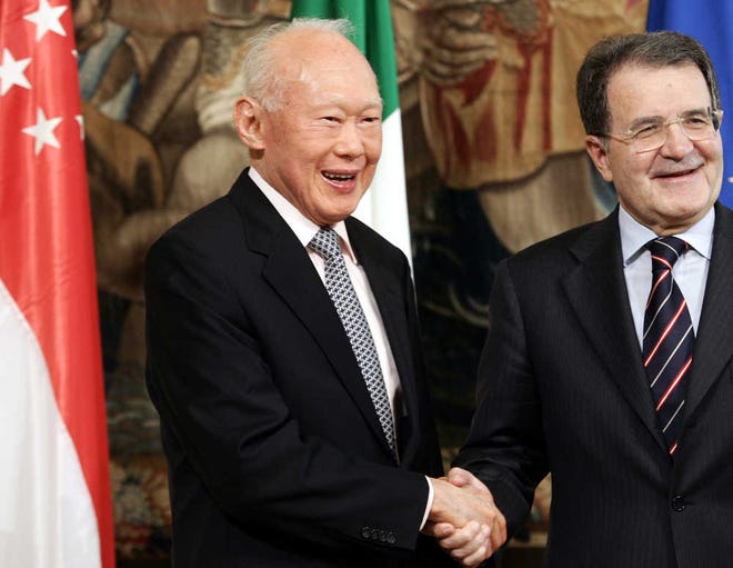In this May 17, 2007, file photo, Singapore's then former Prime Minister Lee Kuan Yew, left, is greeted by Italian Premier Romano Prodi, right, at the Chigi Premier's palace in Rome. One of the last of a generation of Southeast Asian strongmen, Lee died Monday, March 23, at age 91.