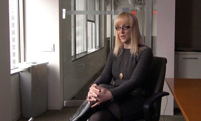 This image from video shows Allyson Robinson, policy director for an association of lesbian, gay, bisexual and transgender military personnel called Service members, Partners, and Allies for Respect and Tolerance for All, or SPARTA, during an interview with The Associated Press on Tuesday, March 24, in Washington.