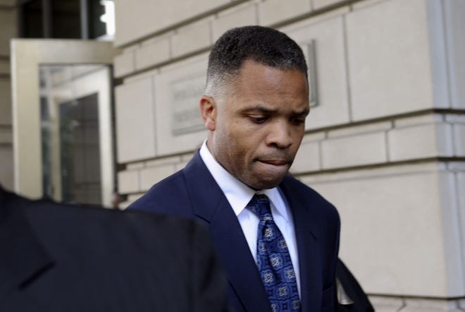 In this Aug. 14, 2013, photo, former Illinois Rep. Jesse Jackson Jr., leaves federal court in Washington after being sentenced to 2 1/2 years in prison for misusing $750,000 in campaign funds. Jackson Jr. will be released from a federal prison on Thursday, March 26, 2015, and will serve out the remainder of his term in a Washington, D.C., halfway house, former U.S. Rep. Patrick Kennedy told The Associated Press after visiting Jackson behind bars. AP FILE PHOTO