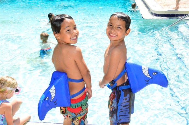 Twin brothers Anthony and Aiden Henzel enjoy a pool day at Emerald Coast Scuba.