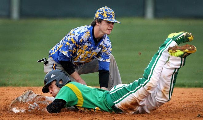 Bessemer City's Tyler Swift slides into second base for a double ahead of the tag from Highland Tech shortstop Easton Payton during their game Friday night.