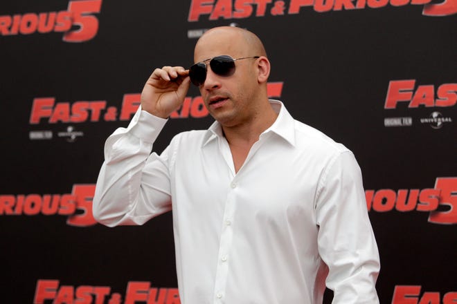 FILE - In this April 29, 2011, file photo, Actor Vin Diesel poses during the photo call of the movie "Fast and Furious 5", in Rome. Diesel said Friday, March 27, 2015, that the latest "Fast & Furious" film deserves a best picture Oscar but has two strikes against it when it comes to the Academy, it's an action flick and it's a sequel. (AP Photo/Andrew Medichini, File)