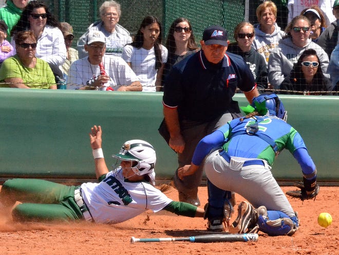 Stetson's Jessie TenBroeck slides into home safely during a squeeze bunt in the bottom of the fifth inning of Game 1 on Saturday.