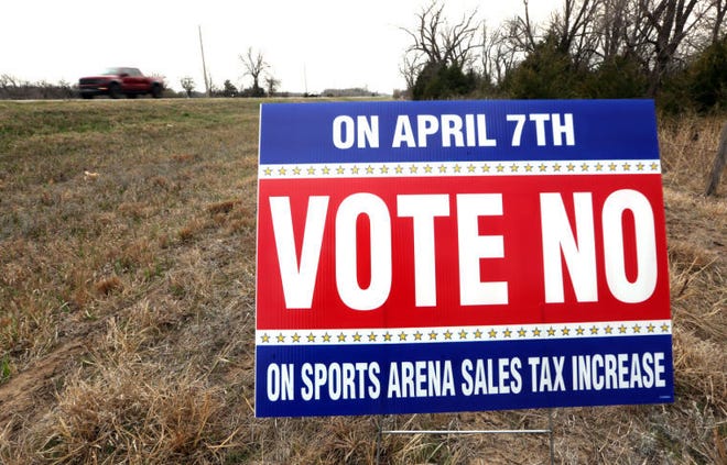 A 'Vote No' for the sales tax increase for the Sports Arena sign is seen on North Plum Street Wednesday, March 25, 2015.