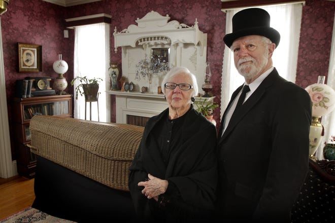 Alice and Fred Reinhardt in their Woonsocket home with a wicker coffin in their parlor. Both are antique collectors and dealers who have acquired Victorian mourning memorabilia over the years.



The Providence Journal / Kris Craig