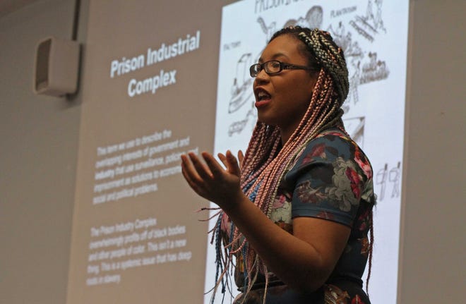 RISD student Yelitsa Jean Charles speaks about the myth of the post-racial society at the DIVE RI diversity conference on Saturday at URI. 

The Providence Journal/Steve Szydlowski