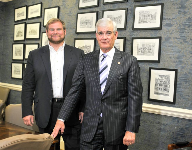 Photos by Steve Bisson/Savannah Morning News- Jim Turner, right, is the founder and president of J.T. Turner Construction while his son Tripp is the chief operating officer.