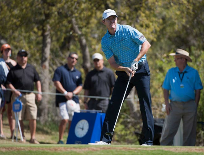 Jimmy Walker watches his drive from the first tee during the third round of the Valero Texas Open golf tournament, Saturday, March 28, 2015, in San Antonio. (AP Photo/Darren Abate)
