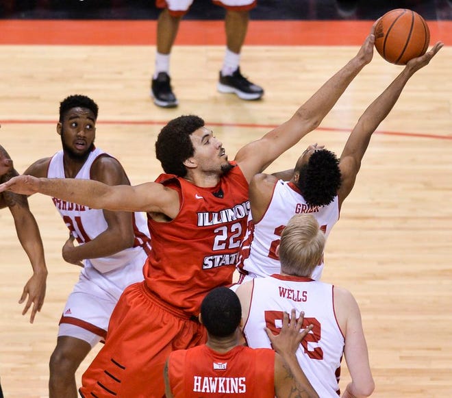 Illinois State's Reggie Lynch (22) blocks the shot of Bradley's Omari Grier during the first half of a game this season at Carver Arena.