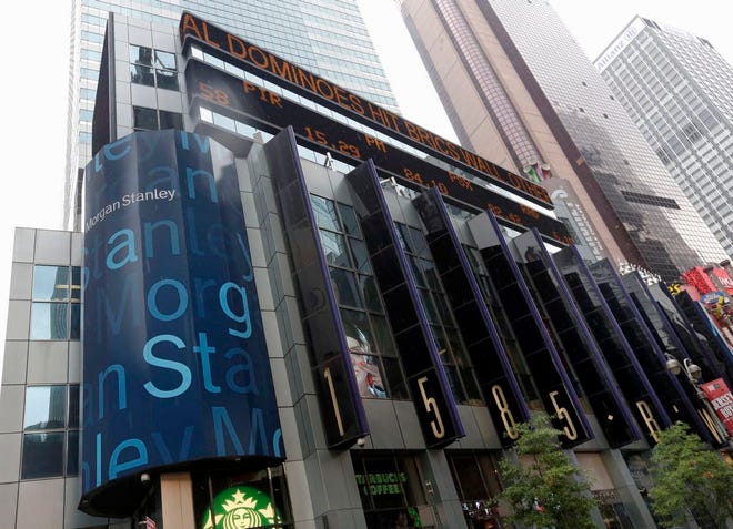 In this photo taken Aug. 12, 2014, the headquarters of Morgan Stanley, near Times Square, in New York. Two Morgan Stanley-backed Chinese companies will not be filing their financial statements on time and have stopped trading in their stocks, raising concerns about their accounting and the U.S. banking giant’s stewardship of $1.4 billion entrusted to its Asian investing arm. (AP Photo/Richard Drew)