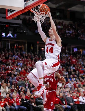 Frank Kaminsky, a unanimous selection to the AP's first team, sparked Wisconsin to a Final Four berth.