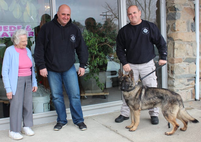 SPECTATOR PHOTO BY GEORGE AUSTIN

From left to right are Vera Sypko, a Somerset resident and owner of Community Cleansers who donated the money needed to buy a dog for the Somerset Police Department's K-9 unit. Police Chief George McNeil and Jared Linhares who will be the Police Department's K-9 officer.