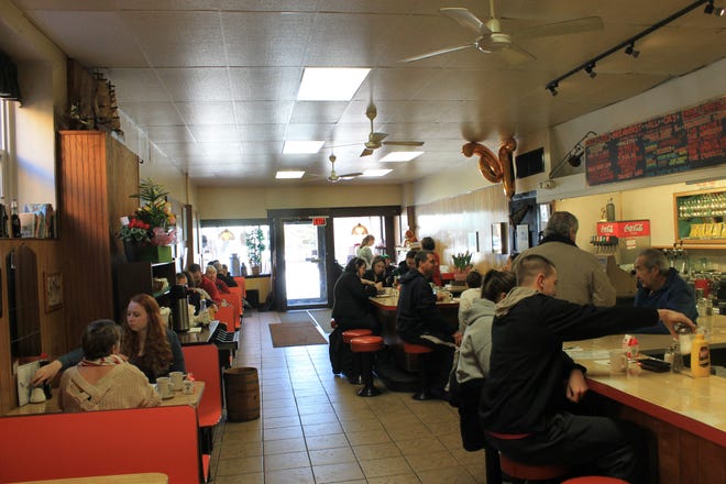 Customers gathered for a last chance to eat at Brighton's Mandy and Joe's Sunday before it closed. Matt Robare/Wicked Local photo