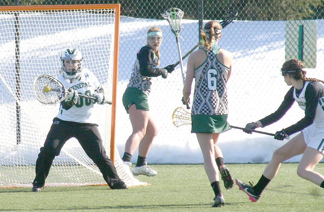 Goalie Brittany Purcell (left) makes a save for Herkimer College during the first half of Wednesday’s game against Mohawk Valley Community College. 



Times PhotoO/Jon Rathbun