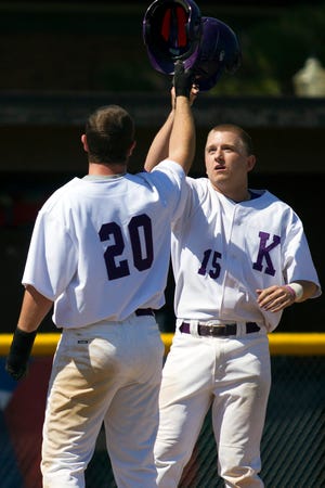 Knox CollegeþÄôs Matt McCaffrey, right, is greeted at the plate by teammate Drake Sykes after a home run during the first game of a doubleheader with Cornell College on Saturday at Blodgett Field. The Prairie won 8-5. STEVE DAVIS/The Register-Mail