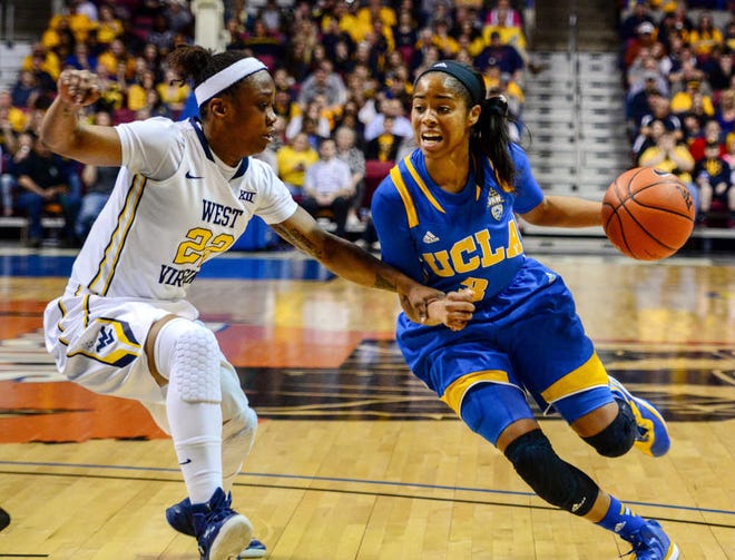 UCLA's Jordin Canada (3) drives as West Virginia's Linda Stepney (22) defends during the first half of the WNIT championship college basketball game in Charleston, W.Va., Saturday, April 4, 2015. UCLA won 62-60 (AP Photo/Tyler Evert)