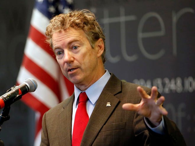 In this March 20, 2015, file photo, Sen., Rand Paul, R-Ky. speaks in Manchester, N.H. Ready to enter the Republican chase for the party's presidential nomination this week, the first-term Kentucky senator has designs on changing how Republicans go about getting elected to the White House and how they govern once there. Paul will do so with an approach to politics that is often downbeat and usually dour, which just might work in a nation deeply frustrated with Washington.