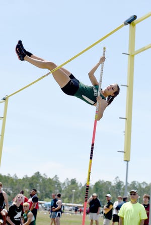 Haley Anderson pole vaults at Tuesday's district track meet
