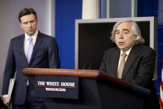 Energy Secretary Dr. Ernest Moniz, right, accompanied by White House Press secretary Josh Earnest, speaks to the media during the daily briefing in the Brady Press Briefing Room of the White House in Washington, Monday, April 6, 2015. President Barack Obama is casting the Iran talks as part of a broader foreign policy doctrine that sees American power as a safeguard that gives him the ability to take calculated risks. (AP Photo/Pablo Martinez Monsivais)