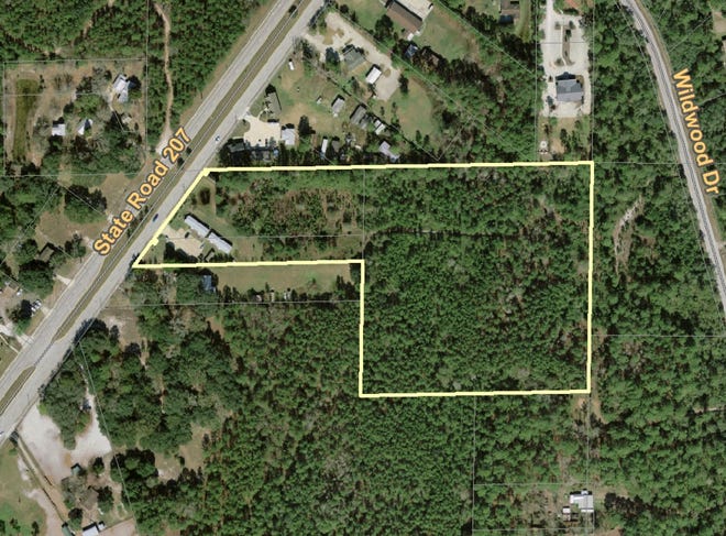 An aerial image shows the site off State Road 207 near Wildwood Drive where officials plan to build a campus for the homeless that will include housing and other support services. The plan calls for five residential buildings with 100 apartment units as well as two support buildings and 143 parking spaces. The effort is backed by Home Again St. Johns, a local nonprofit, and other agencies.