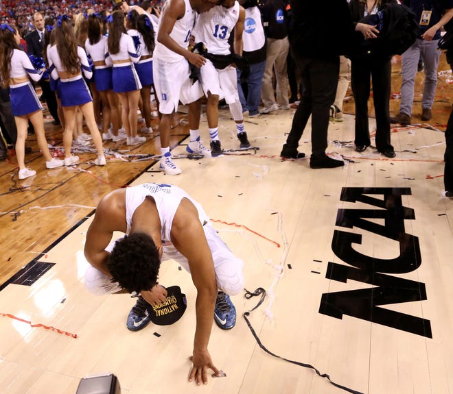 Duke Blue Devils guard Quinn Cook (2) cries after the team's 68-63 win over Wisconsin in the NCAA National Championship game on Monday, April 6, 2015, at Lucas Oil Stadium in Indianapolis. (Sam Riche/TNS)